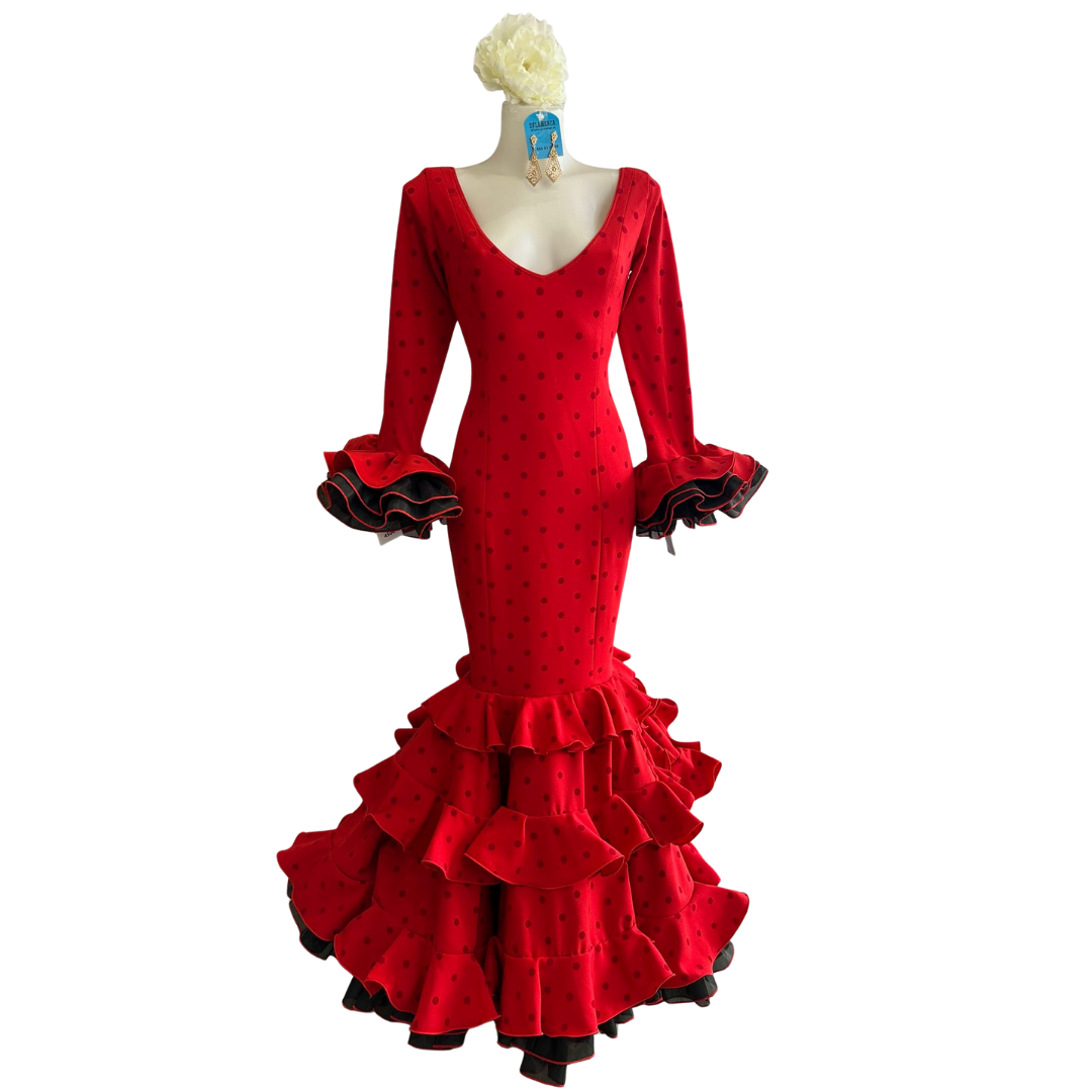 Vestido de flamenca rojo con lunares rojo oscuro, diseño exclusivo de la colección Aires de Guadalupe con vuelo y confección artesanal.