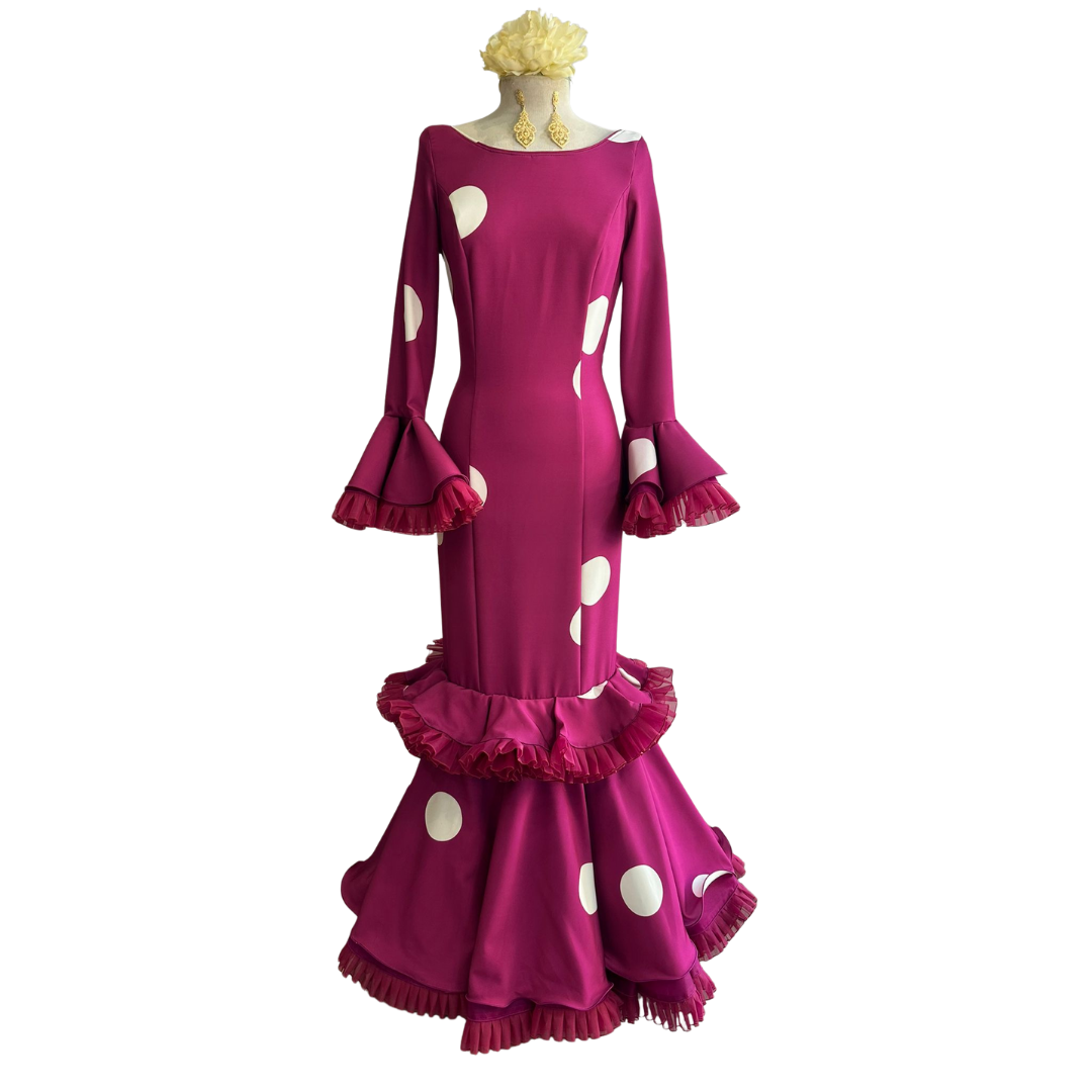 Vestido de flamenca buganvilla con lunares blancos, corte entallado y espalda al aire, ideal para ferias y romerías